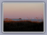 pier and dunes sunset